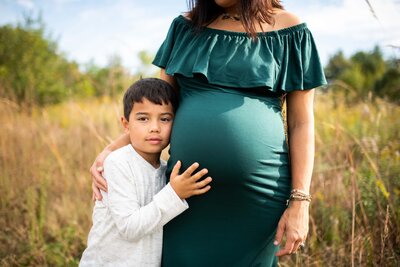 Son with pregnant mom
