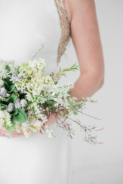 Spring blue and white bridal bouquet muscari and lilac