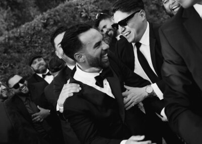 Bride and groom embrace in an elegant moment at a luxurious Arizona wedding venue.