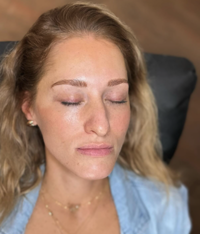 Close-up of client with microblade and nano brows at Lavender & Ink Studios in New Franken, WI