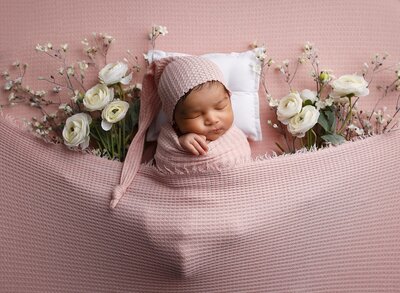 A boho baby girl in florals.