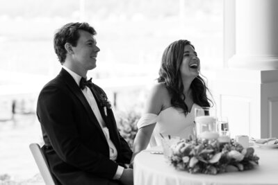 bride and groom reactions to speeches during their reception during their grand rapids michigan wedding photography
