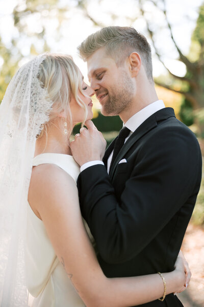 newlyweds about to kiss