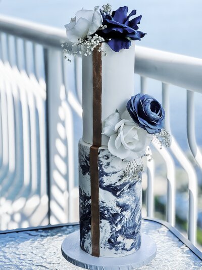 Navy Blue Marbled Cake design overlooking the water