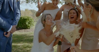 groom kisses brides shoulder