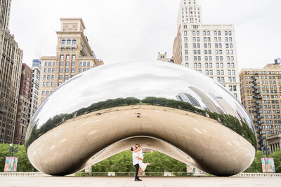 Image of Couple in front of the Bean sculpture in Chicago for review of Eliana Melmed Photography