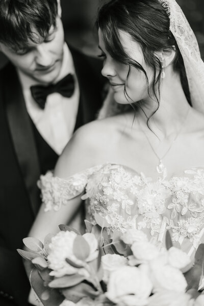 an engaged couple kissing