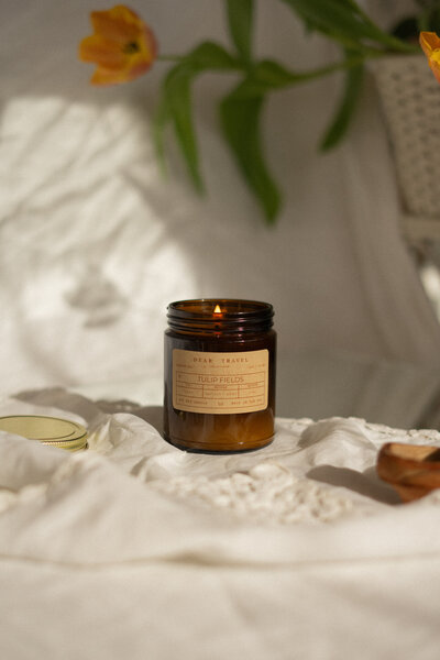 Tulip fields travel themed candle with wood wick and natural soy in a reusable container