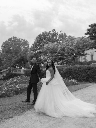 Romantic and whimsical wedding portraits with lush red florals at Meridian House DC wedding Venue