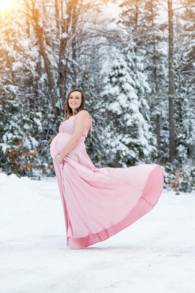 Photo of Expecting Mother holding belly | Photographed by Maine Photographer