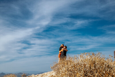 two women kiss after propsal of marriage phoenix