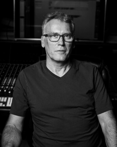 Brand photo headshot of producer Paul Milner