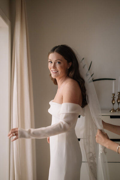 This breathtaking wedding at AllSaints Event Venue blends organic elements with modern, high fashion influences. Captured by Danielle Meredith Photography, the couple's chic style is evident in every detail, from the elegant floral arrangements to the sophisticated attire. The venue's contemporary design provides a stunning backdrop for the ceremony and reception, creating a seamless blend of natural beauty and high-end fashion. Keywords: organic wedding, modern wedding, high fashion wedding, AllSaints Event Venue, Danielle Meredith Photography, wedding photography, elegant wedding, contemporary wedding design.