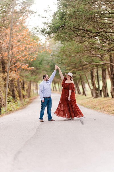 Engagement Portraits with girl wearing boho red dress and flat h