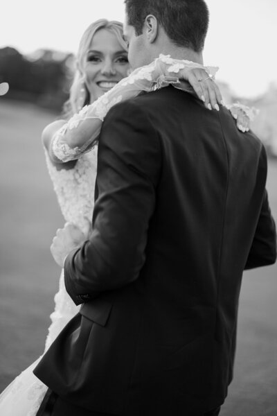 Bride and groom walk up memorial steps at their DC wedding
