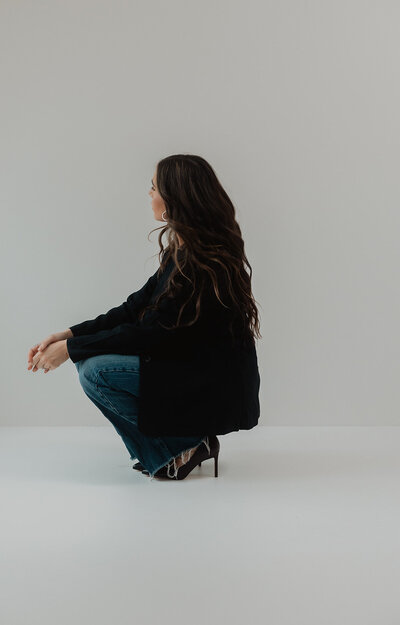 A creative portrait of a woman in a hudson valley photo studio