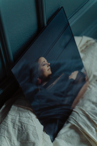 Large modern acrylic statement print resting against a bedroom wall, part of the JPF Galleries keepsake collection.