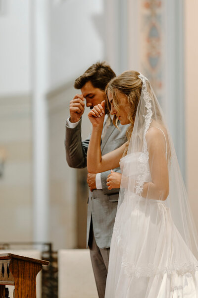 a groom smiling at his bride