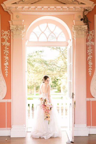 A beautiful bride waits inside the Whitehall wedding venue to get married with Maryland Wedding Photographer