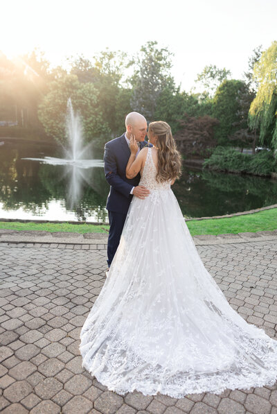 Bride and groom smiling at Bridgewater Manor Wedding