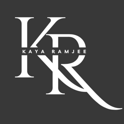 Stylized white “KR” monogram logo with “Kaya Ramjee” in small caps across the center on a dark gray background.