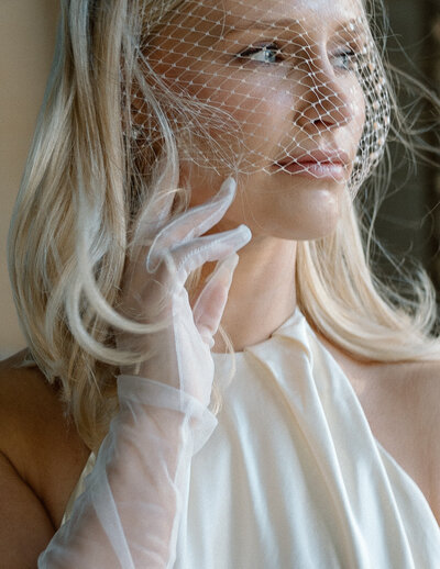 Close-up portrait of a solo bride on film, captured by a Wisconsin wedding photographer.