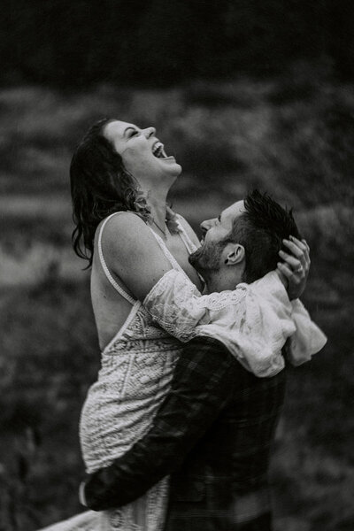 A black elopement wedding couple embracing at Short Sand Beach in Oswald West State Park, Oregon.