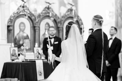 A bride and her bridesmaids smile and laugh with one another at John Joseph Inn before the bride gets married. 