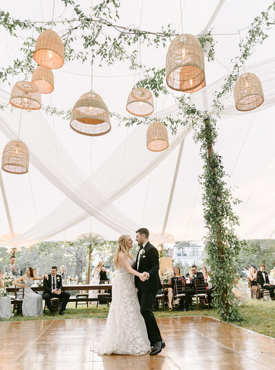 Bride & Groom have their first dance during a tented reception
