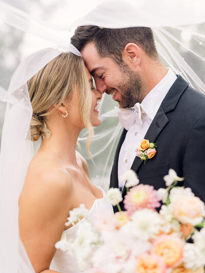 Bride and groom walk up memorial steps at their DC wedding