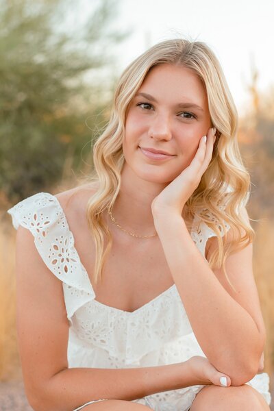 senior girl posing for senior photos in silver leaf in north scottsdale az
