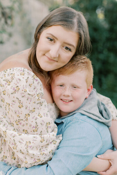 Southern Maryland Family Photographer with her redheaded son. 