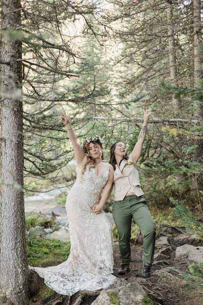 Lauren & Amber smiling after their elopement at Moraine Lake in Alberta 