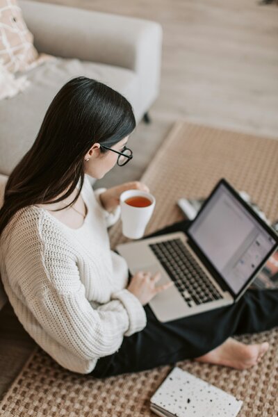 Image of working women enjoying a cup of tea, symbolizing the balance of work and wellness. At Creative Dynamics, we believe in supporting a harmonious work environment where self-care and productivity go hand in hand. Discover how our services in virtual assistance and business coaching help create a balanced and thriving work-life experience. Image credit: Unsplash.