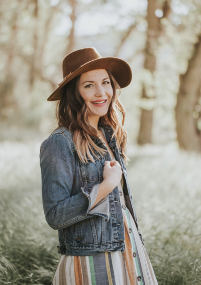 woman smiling in white shirt