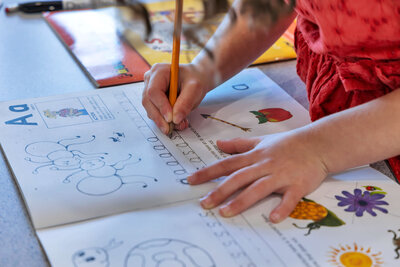 Preschool Students Learning How To Write