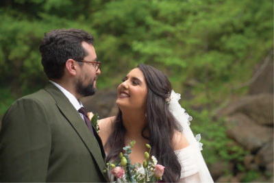 bride and groom looking at each other