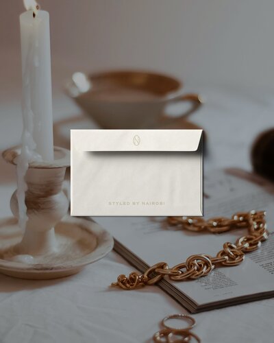 Custom brand identity package for a timeless hair salon, including logo, color palette, and brand elements.