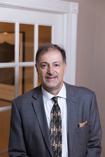 Headshot of Michael L. Luchetta in his Colorado Springs office.