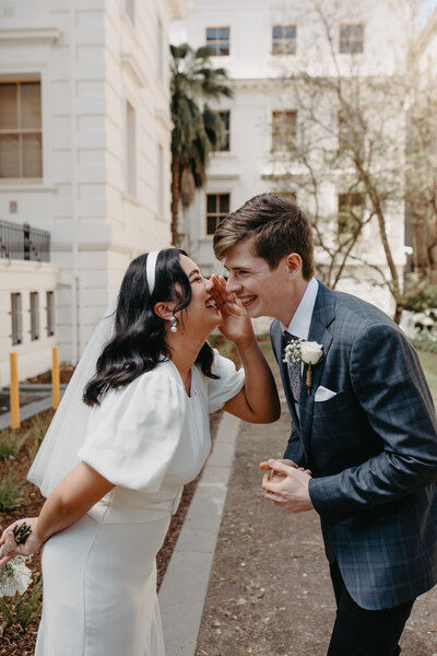 modern bride and groom outside fitzroy venue on the corner