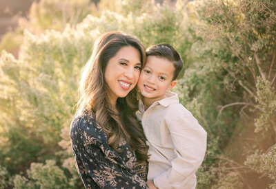Oceanside family photographer, Tristan Quigley, photographs a mom and her son at Guajome Regional park