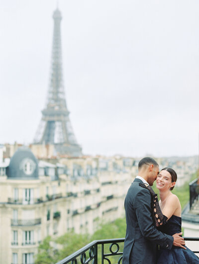 Bride and groom at Paris elopement by Eiffel Tower.