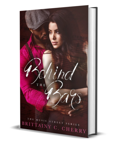 man with beard wearing a white shirt looks down on the cover of the air he breathes by romance author brittainy cherry