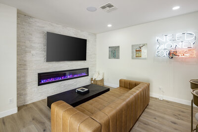 stacked stone by MSI, electric fireplace by Amantii, Engineered hardwood floors.