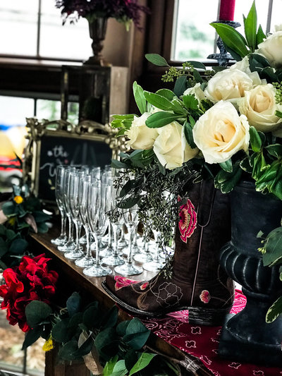 Champagne glassware and florals