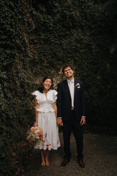 bride and groom having portraits at their gorgeous Heide Museum of Modern Art wedding