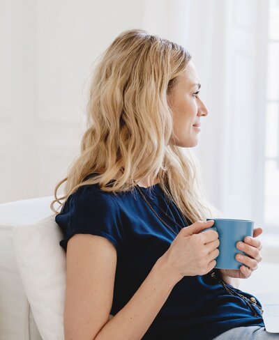Woman contemplating Aspire Desire Coaching