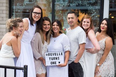 a team photo of the Revelle owners during their 1st anniversary celebration.  Captured outdoors by Ottawa Event Photographer JEMMAN Photography COMMERCIAL