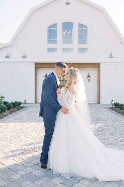 Greenville Wedding Photography | Bride and groom standing in front of wedding venue
