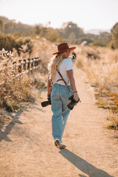 woman holding camera